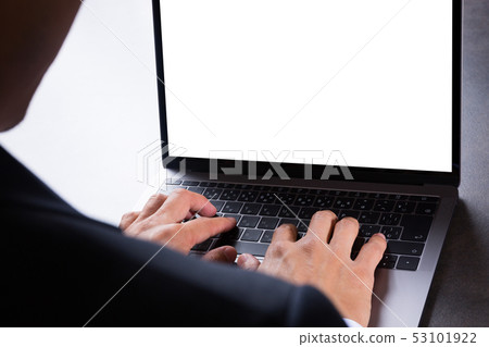 Businessman using a laptop 53101922