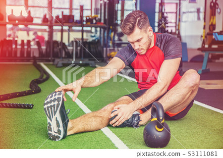 Young Adult Man Warming up for Sport in Fitness 53111081