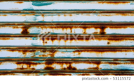 Metal shutter door. Gry color with rust running 53115572