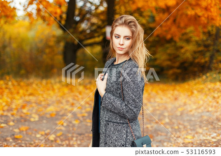 Happy beautiful young woman with a smile Happy beautiful young woman with a smile 53116593