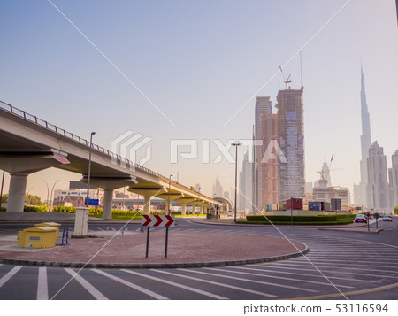Streets with modern skyscrapers of the city of Dubai. Streets with modern skyscrapers of the city of Dubai. 53116594