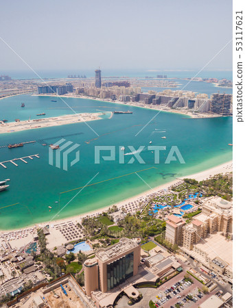 View on residential buildings on Palm Jumeirah island. The Palm Jumeirah is an artificial 53117621