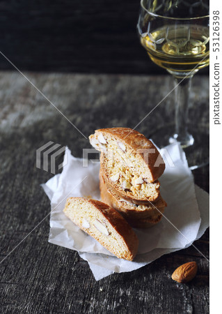 Italian cookies: almond cantucci and glass of wine 53126398
