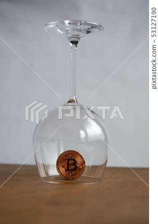 Bitcoin covered by a glass Bitcoin covered by a glass 53127190