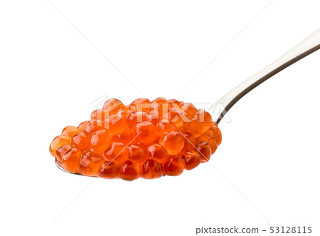 Spoon of salted salmon caviar carved on a white 53128115