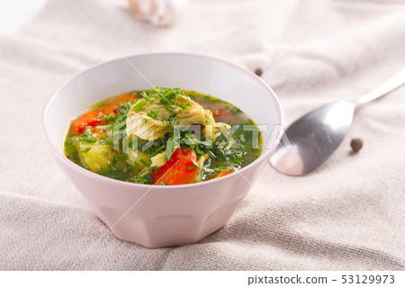 Tasty soup with chicken and vegetables. closeup Tasty soup with chicken and vegetables. closeup 53129973