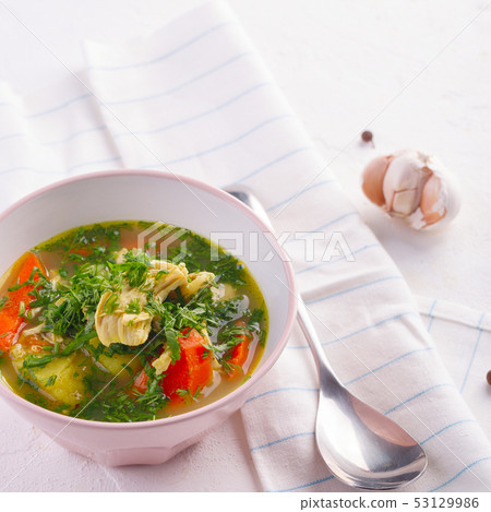 Tasty soup with chicken and vegetables. closeup 53129986
