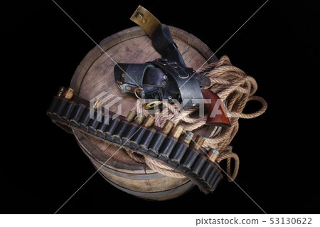 Old wild west gun with cartridges and gunbelt Old wild west gun with cartridges and gunbelt 53130622
