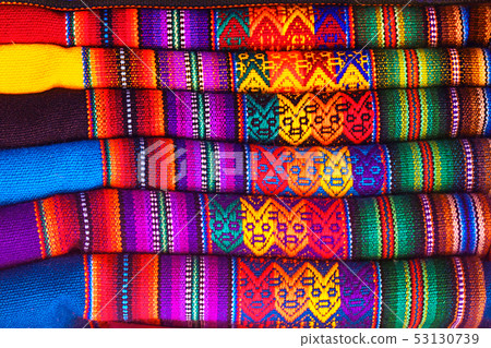 Peruvian traditional colourful native handicraft textile fabric at market in Machu Picchu, one of 53130739