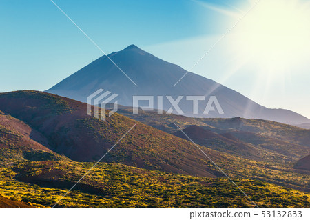 El teide volcano in the canary islands with a blue El teide volcano in the canary islands with a blue 53132833