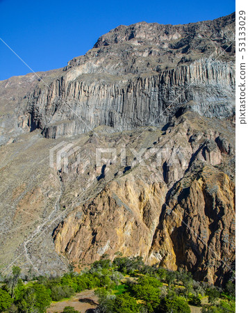 Green oasis on the bottom of Colca Canyon in Peru 53133029