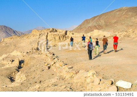 Tourists in Los Paredones - Incan ruins near Nasca, Peru, South America Tourists in Los Paredones - Incan ruins near Nasca, Peru, South America 53133491