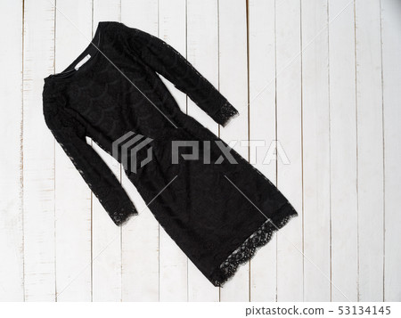 Little black lace dress with sleeves on white 53134145