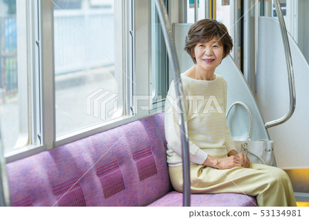 Senior woman Train Travel photography cooperation: Keio Electric Railway Co., Ltd. 53134981