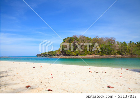 Sandy beach with the sea background. 53137812
