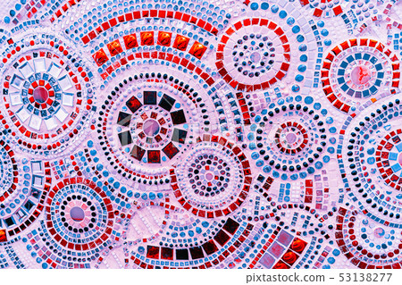 Wall texture decorated with multicolored ceramics. 53138277