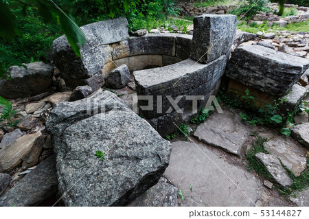Ancient round ruined dolmen in the valley of the Ancient round ruined dolmen in the valley of the 53144827