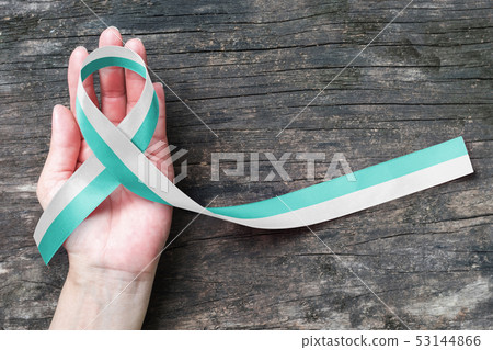 Cervical Cancer awareness teal and white ribbon Cervical Cancer awareness teal and white ribbon 53144866