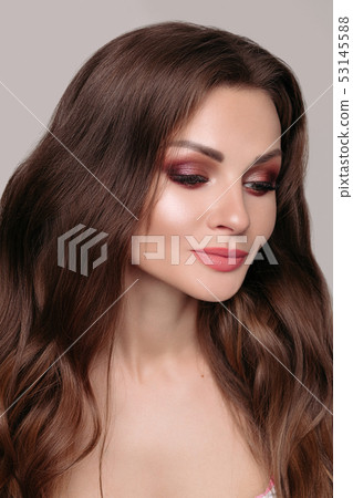 Beautiful brunette woman with bright make up. Beautiful brunette woman with bright make up. 53145588