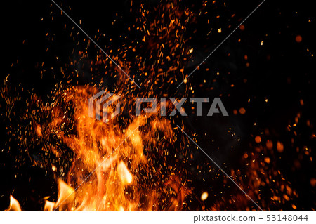 Detail of fire sparks isolated on black background Detail of fire sparks isolated on black background 53148044