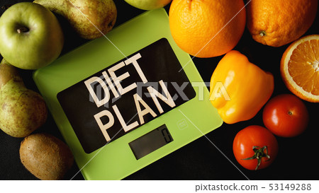Concept diet. Healthy food, kitchen weight scale. Vegetables and fruits 53149288