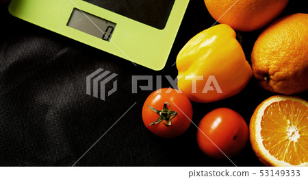 Concept diet. Healthy food, kitchen weight scale. Vegetables and fruits 53149333