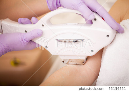 Skin care. Hands Laser epilation and cosmetology. Hair removal cosmetology procedure. 53154531