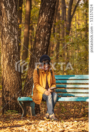 Hipster girl in a park 53157024