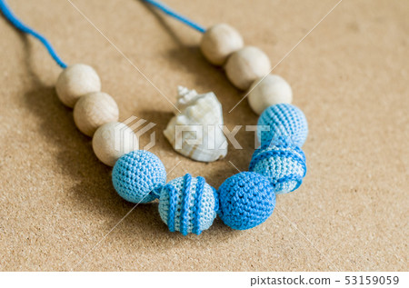 Necklace made from knitted beads and toys for the Necklace made from knitted beads and toys for the 53159059