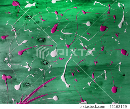 Artist working wooden table top with paint  marks 53162159
