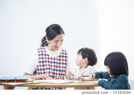 Nursery teacher and children, drawing Nursery teacher and children, drawing 53165690