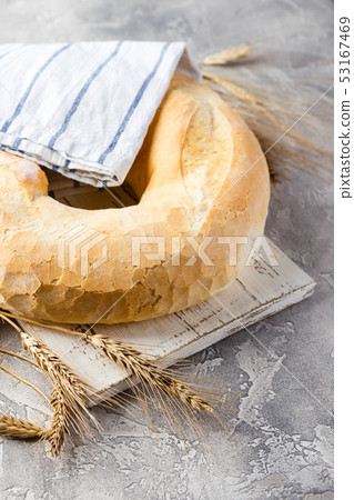 Round loaf of wheat bread Round loaf of wheat bread 53167469