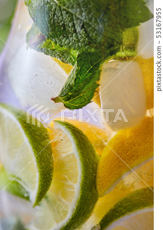 Summer drink glass of lemonade with lime and mint leaf. Summer drink glass of lemonade with lime and mint leaf. 53167955