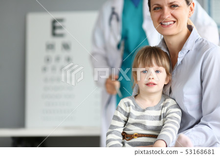 Happy smiling family at child doctor office Happy smiling family at child doctor office 53168681