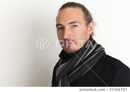 Positive young adult Asian man in black 53168787