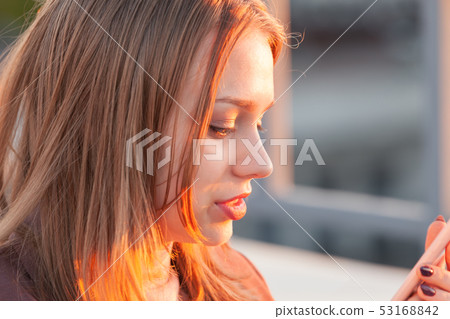 Beautiful blond teenage girl Beautiful blond teenage girl 53168842