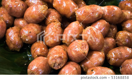 Close up of Thai style sausages on banana leaf Close up of Thai style sausages on banana leaf 53168858