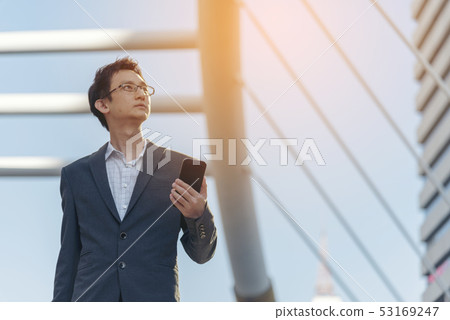 Portrait of young businessman outdoor. Businessman 53169247