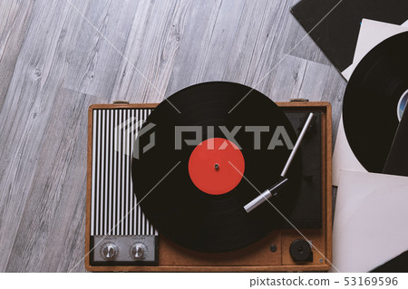 Vintage turntable with a vinyl record Vintage turntable with a vinyl record 53169596