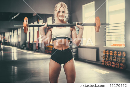 strong sexy athletic young woman working out in 53170552