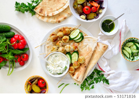 Greek turkey meatballs with pita and tzatziki Greek turkey meatballs with pita and tzatziki 53171816