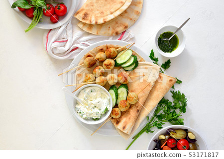 Greek turkey meatballs with pita and tzatziki Greek turkey meatballs with pita and tzatziki 53171817
