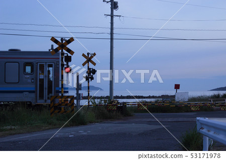 Railroad crossing at the beach Railroad crossing at the beach 53171978