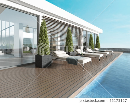 Terrace by the pool with sun loungers near the Terrace by the pool with sun loungers near the 53173127