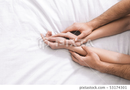 Young passionate couple making love in bed 53174301