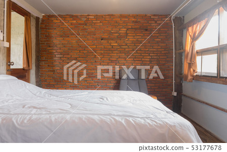 White Bed and Arm Chair in Country Loft Interior White Bed and Arm Chair in Country Loft Interior 53177678