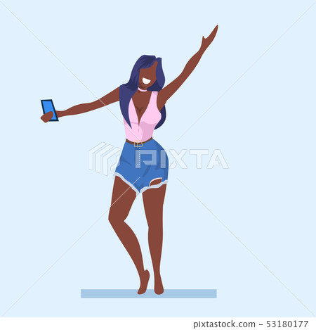 casual woman taking selfie photo on smartphone camera young african american girl raising hand 53180177