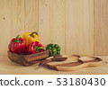 sweet peppers on wooden table background 53180430