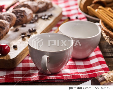 Oatmeal chocolate cookies with coffee grains and cherry. Sun flare 53180459