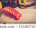 sweet peppers on wooden table background 53180710
